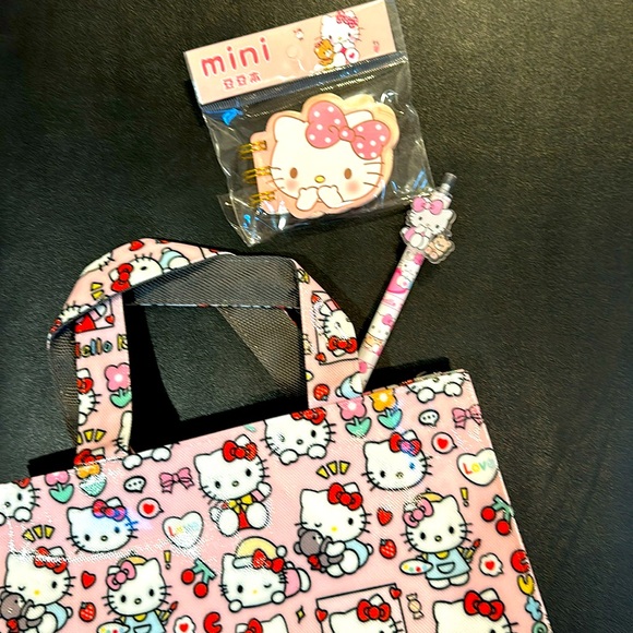 💗🆕Hello Kitty waterproof bag with Mini notebook and Pen! Adorable! New! - Picture 2 of 5